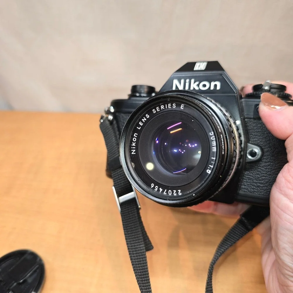 Nikon‎ EM 35mm Camera body lens series e flash cases for camera manuals timer